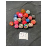 large lot of rubber bouncy balls