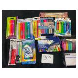 lot of new markers highlighters and paint sticks