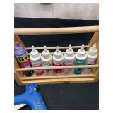 lot of fabric glues with wooden caddie glue guns