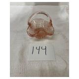 small pink glass basket