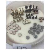 appears to be hand craved bone gaming pieces