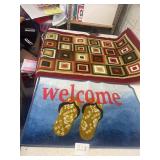 large welcome mat and rug