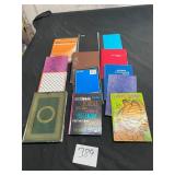 lot of pocket sized notebooks