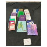 lot of pocket sized notebooks