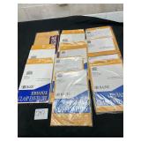 11 packs of manila envelopes