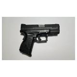Springfield Armory XDm 3.8 .40 pistol with accessories