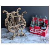 music clef magazine rack and 6 pack of UK coke...
