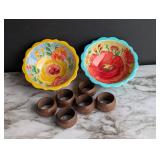 2 colorful floral bowls and six wooden napkin...