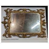 rectangular mirror with ornate gold frame