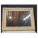 decorative ornate gold mirror, some cracking in...