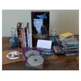 assorted CDs, DVDs, cassettes