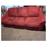 red/maroon microfiber/suede-like couch