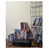 Magnavox VHS/DVD w/ 65 Movies/Shows and Media Rack