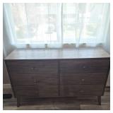Six‑Drawer Wood‑Grain Laminate Dresser