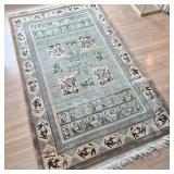 Mythic‑Figural Woven Wool Rug in Earthy Tones — 8' × 5'