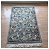 Blue & Earthtones Wool Rug with Crane Motif
