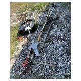 limb saw, bulb planter, drain pan