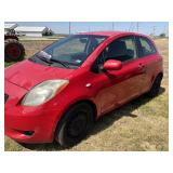 2007 RED TOYOTA YARIS, HAVE TITLE, DROVE HERE