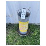 wayne feeds M&M dispenser / chicken feeder