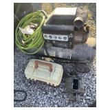 tackle box, air compressor, holly carb.