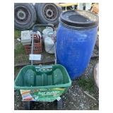 fert. spreader and blue feed barrel