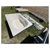 pvc pipe and tub and window well