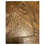 Six costume jewelry necklaces