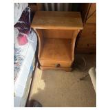 A bedside table with drawer