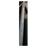 The image displays the spine of a book titled