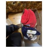 A box of crafts and miscellaneous clothes