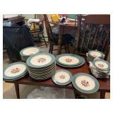 A complete set of plates and cups and other things