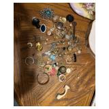 This lot has a lot of mismatched earrings in it