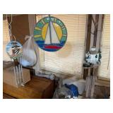 This lot has two wind chimes and one suncatcher