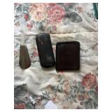 Wallet, glasses, case with glasses and a thing t