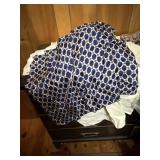 A lot of table runners And a dress