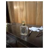 This vintage collectible item is an Avon glass
