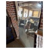 Large mirror slightly damaged on one corner