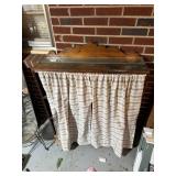 Four tier shelf with curtains