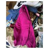 A pile of ladies sweaters