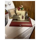 This item is a vintage Sew-O-Matic Senior toy