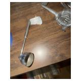 This item is a vintage novelty bar tool set