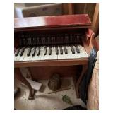 Vintage childrenï¿½s wooden piano