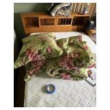 A rose pillow and comforter set