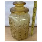 Decorative brown glass jar with lid