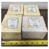 Lot of four cherished teddies in box