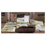 Box lot of vtg. Postcards and foreign money