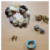 1 bracelet and 4 clip on earrings all costume