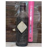 One used brown, orange crush bottle / Faded