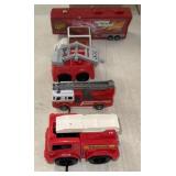 A LOT OF PLASTIC TRUCKS AND TOYS / SHIPS