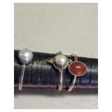3 sterling rings 2 w/pearls & 1 w/ruby